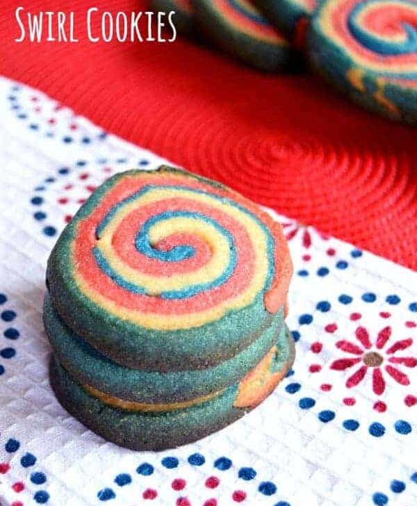 These patriotic swirl cookies are perfect for the 4th of July and definitely worth the effort! You'll never believe the secret to getting a perfect swirl when you cut it!