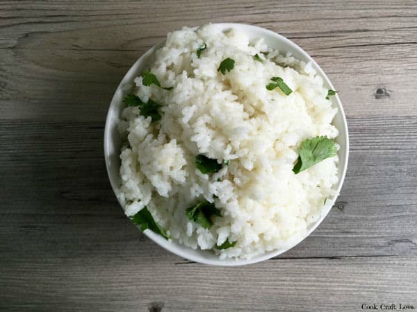Cilantro lime rice is an easy and delicious side dish perfect for your next Mexican feast! And with only 3 ingredients it's sure to be a crowd pleaser!
