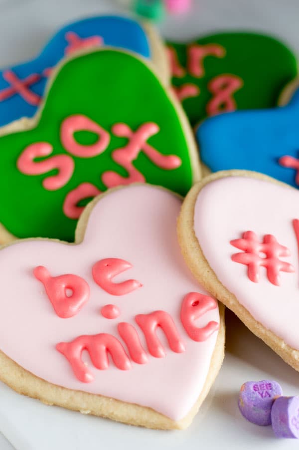 Prepare a sweet treat for your friends and family this Valentine's Day with these conversation heart sugar cookies!