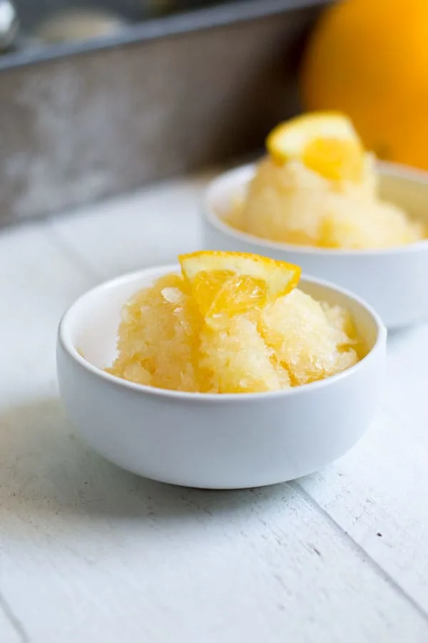 Orange pineapple sorbet is the perfect fruity, sweet, and healthy treat to enjoy when you're trying to beat the heat this summer!