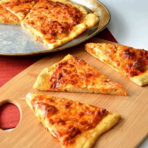 If I had known how easy pizza crust was to make at home I would have saved a lot of money! This pizza crust recipe is so light and fluffy you'll love every bite!
