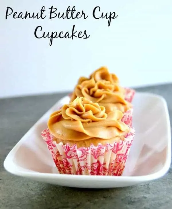 Peanut butter and chocolate come together in the best way in these inside out peanut butter cup cupcakes! Loads of peanut butter with a gooey surprise inside!