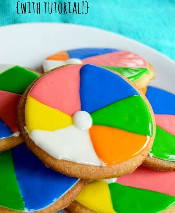 Beach ball cookies are a fun and unique way to celebrate summer! Enjoy these festive beach ball cookies at the end of the school year picnic or by the pool