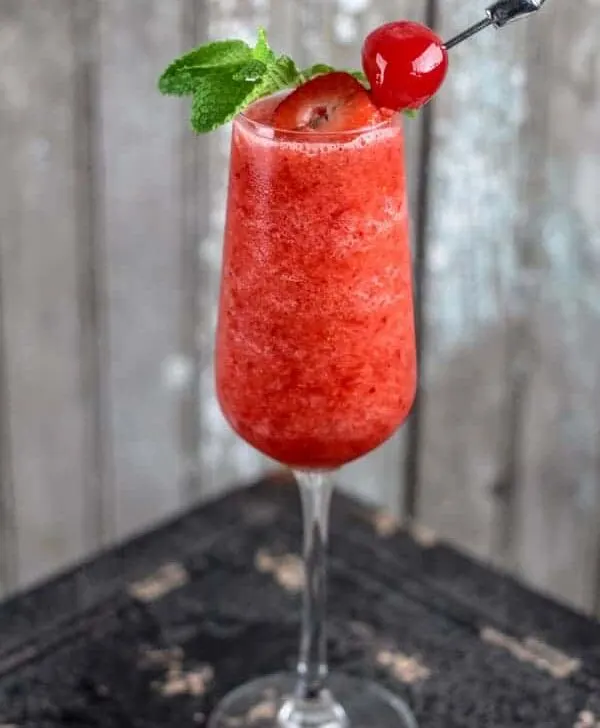 Cherry Strawberry Daquiri is a sweet frozen cocktail perfect for a summer's night of fun!