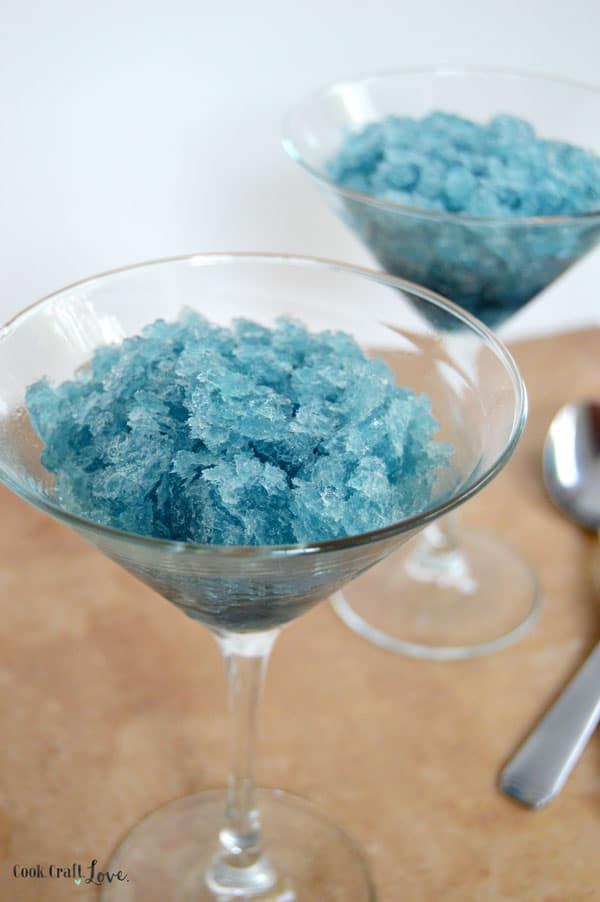 This granita is a delicious grown up slushie with flavors of pomegranate and blue curacao for a fruity and sweet granita perfect for summer!