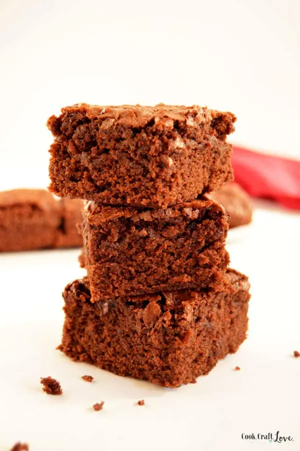 For years I was stuck on brownies from a box until I finally discovered the best homemade fudge brownie recipe! You'll never believe the secret to perfect homemade fudge brownies!