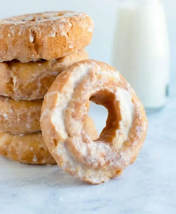 Whether you spell it donut or doughnut you can't go wrong with these easy and delicious old fashioned homemade sour cream doughnuts!