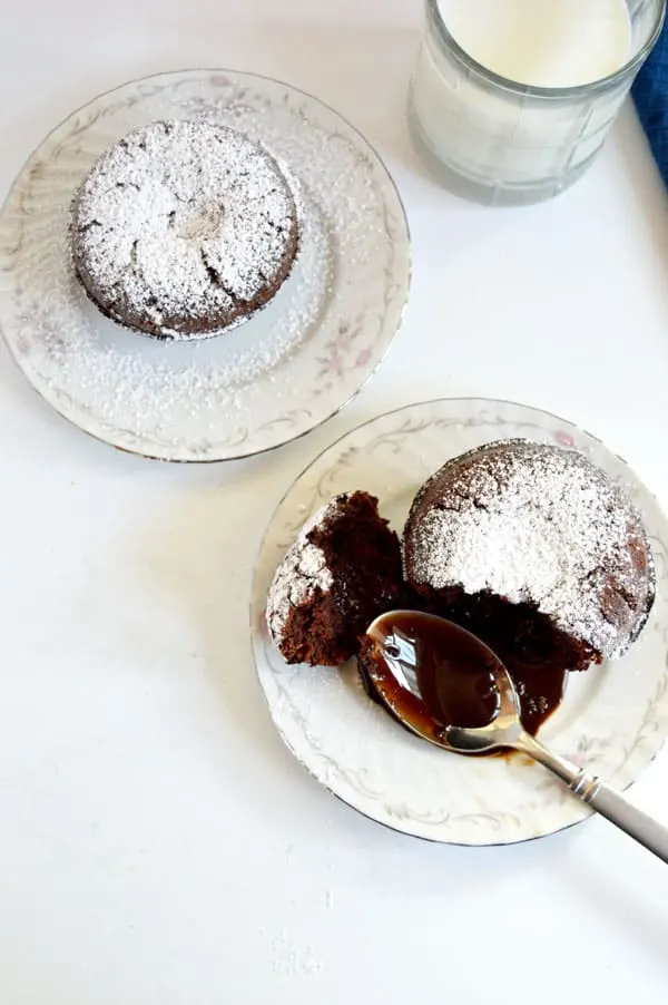 Molten chocolate cake is a decadent dessert that will wow your guests at your next dinner party even though it's an effortless dessert!