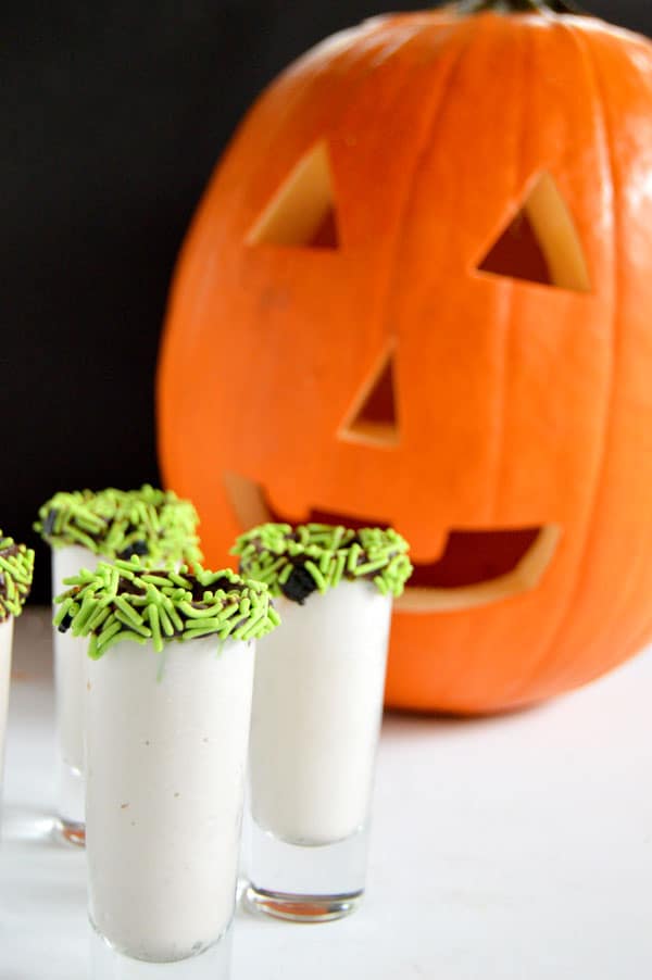 Stay warm and festive with these boozy Halloween milkshake shots! A great treat for a grown up Halloween party or take out the booze for a kid friendly Halloween party.