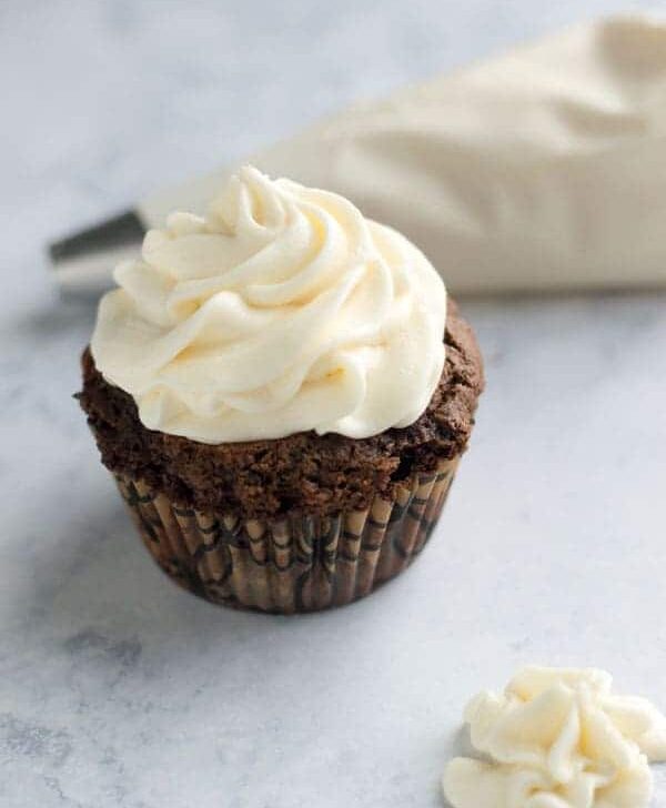 White chocolate ganache frosting is creamy and fluffy and perfect on cupcakes, cookies, or spoons!