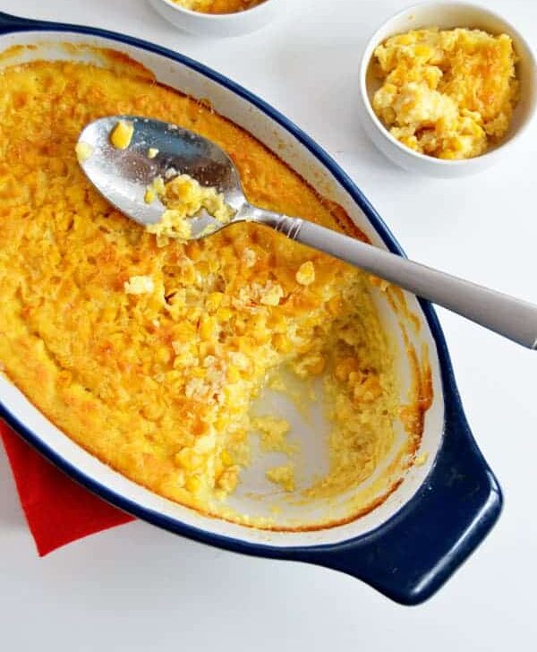 Baked corn casserole is a family favorite at our house for the holidays and beyond! Sweet corn baked into a hearty casserole!