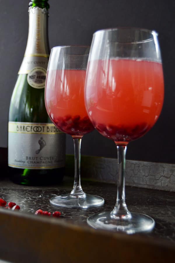 Pomegranate and Champagne create the perfect sweet and tart cocktail for your holiday parties or New Years Eve celebrations!