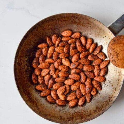 Almonds are toasted with a mixture of spices for a perfect party snack or gift for friends, teachers, and neighbors!
