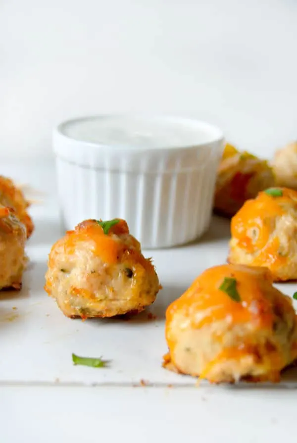 These cheesy cheddar chicken bites are the perfect appetizer for your Super Bowl party, March Madness, or any party in between!