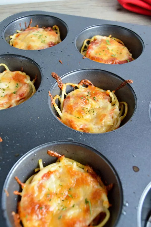 Mini spaghetti pies are a fantastic leftover recipe that are perfect for leftovers and little hands!