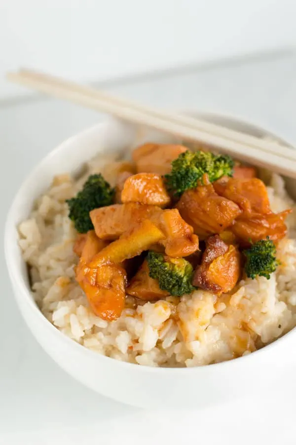 Crock pot orange chicken is a Chinese take out recipe you can make at home with just five ingredients and your slow cooker!