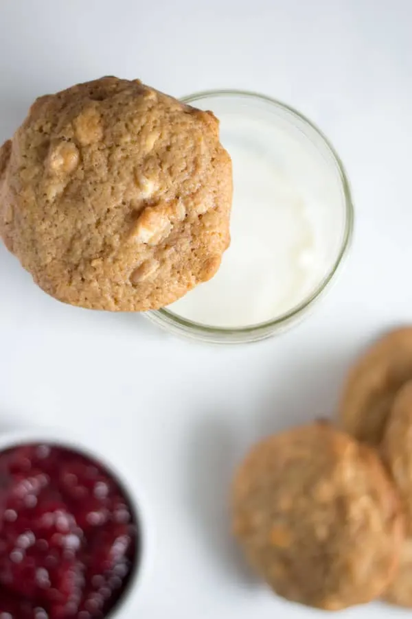Raspberry jam lends a subtle raspberry flavor to these soft and chewy raspberry white chocolate chip cookies!