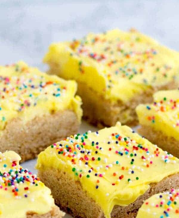 These simple sugar cookie bars are soft, gluten free, and a perfect treat for Easter! You'll want to make these gluten free sugar cookies over and over!