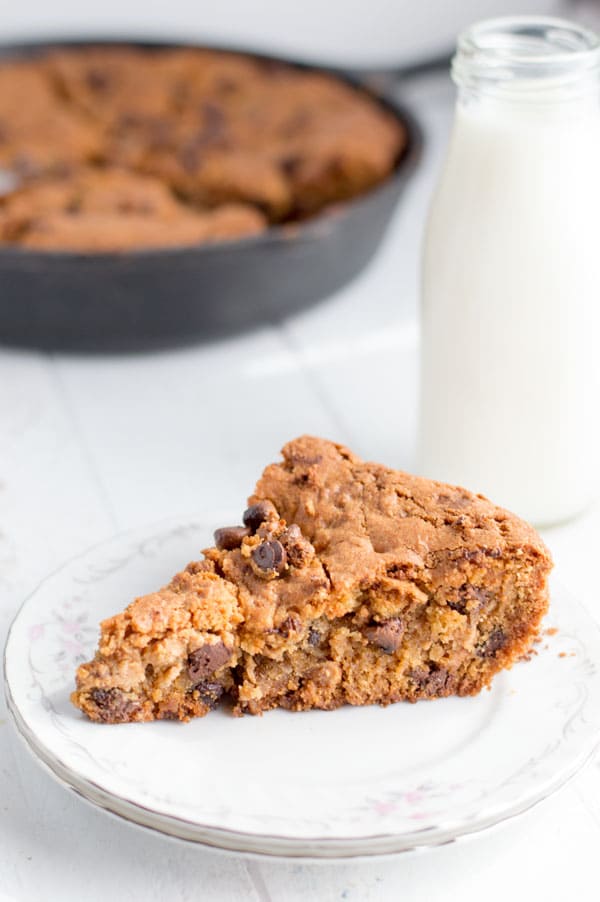 Peanut butter and chocolate come together in a winning combination with this peanut butter cup skillet cookie!