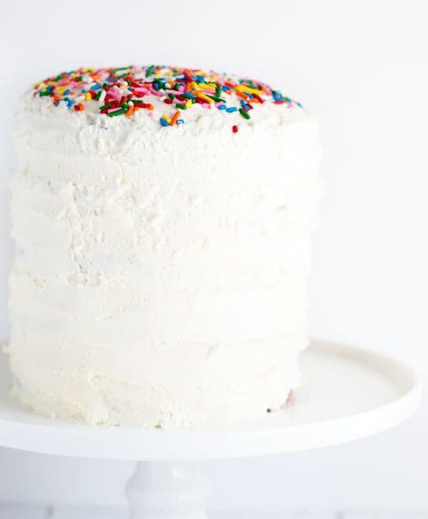 Funfetti cake is a childhood boxed favorite that now you can make from scratch! This cute six inch funfetti cake is sure to be a show stopper!