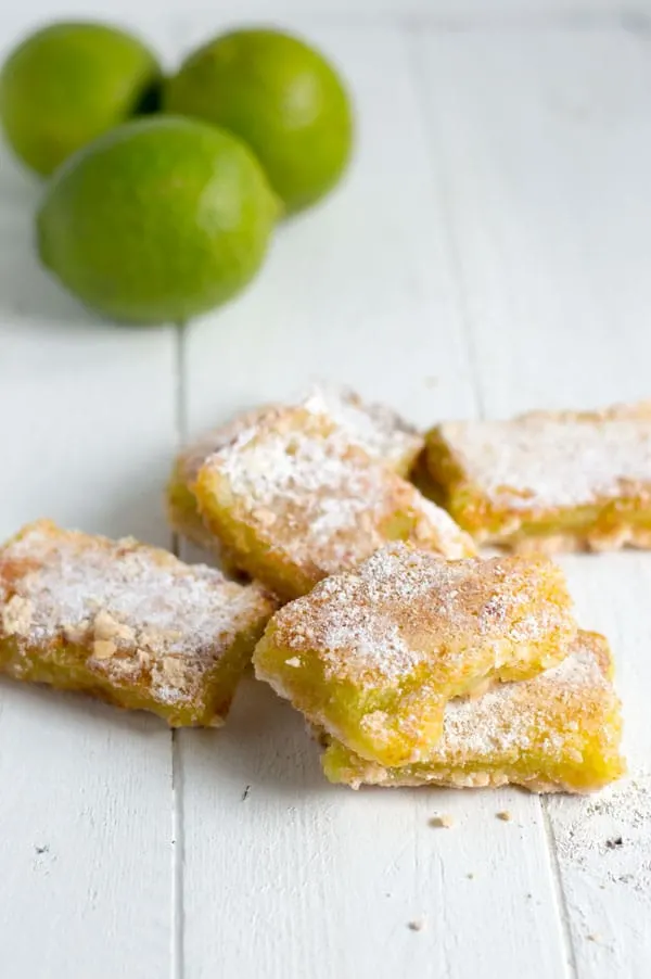 Get ready for Cinco de Mayo and summer with these margarita bars! Tangy bite of lime and tequila make these lime bars perfect for your next fiesta!