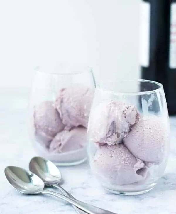 Make your next summer dessert special with a simple red wine ice cream that doesn't need to be cooked or cooled. Add all the ingredients to your ice cream maker and churn until frozen!