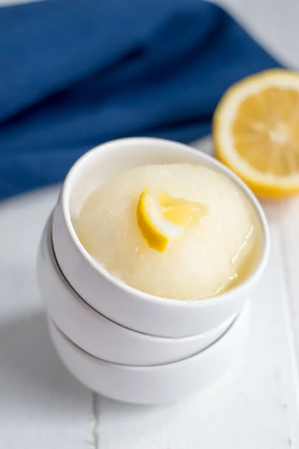 Italian Lemon Ice is one of those desserts that makes me think of my childhood. It's sweet and refreshing and perfect for a summer sweet treat!