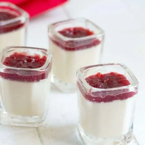 Panna Cotta Shooters are a surprisingly simple, make ahead dessert that will be perfect for your next dinner party or get together!