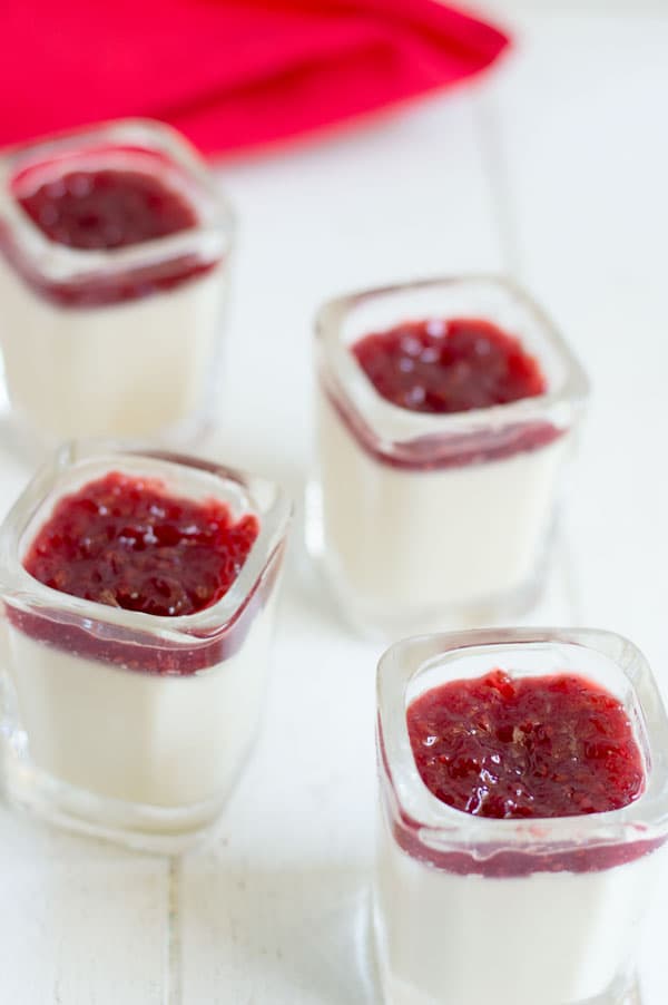 Raspberry Panna Cotta Shooters are a surprisingly simple, make ahead dessert that will be perfect for your next dinner party or get together!