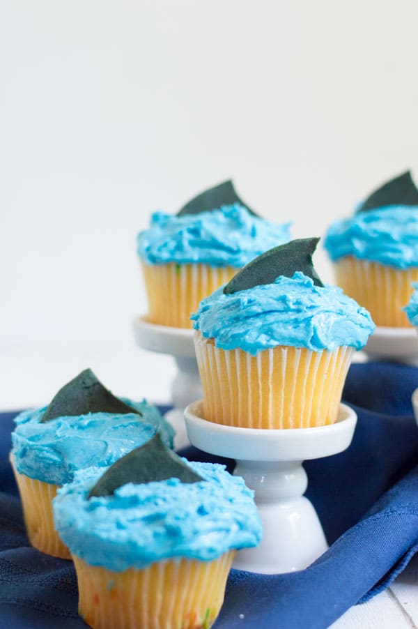 These adorable and simple cupcakes are perfect for your next Shark Week viewing party or day at the beach!