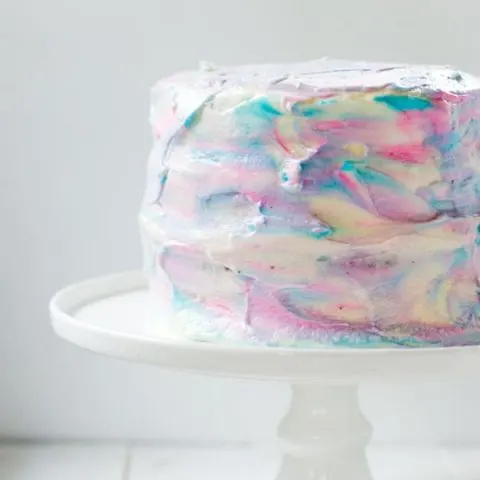 If you're expecting or planning a gender reveal party then this easy marbled gender reveal cake is perfect!