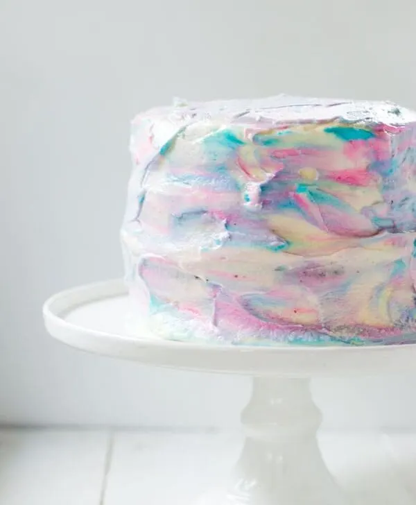 If you're expecting or planning a gender reveal party then this easy marbled gender reveal cake is perfect!