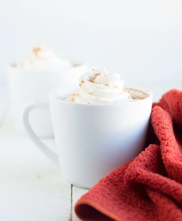 Cozy up this fall and winter with a comforting mug of pumpkin spice white hot chocolate!