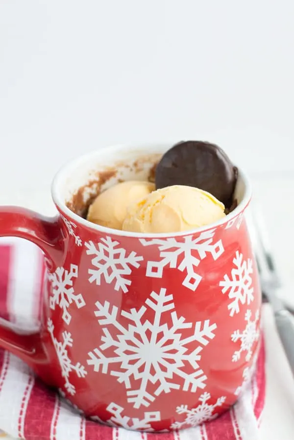 This peppermint chocolate mug cake is perfect for two and is made in the microwave in under 5 minutes!
